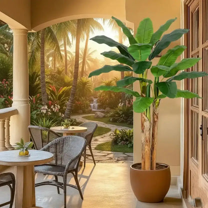 Indoor setting with a potted plant, chairs, and tables in front of a scenic outdoor view.