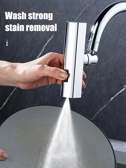 Hand holding a high-pressure water spray head over a sink with text 'Wash strong stain removal'.