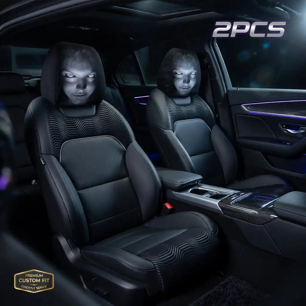Car interior with black leather seats and visible branding.