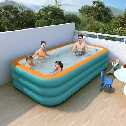 Family enjoying a hot tub on a balcony with a scenic view