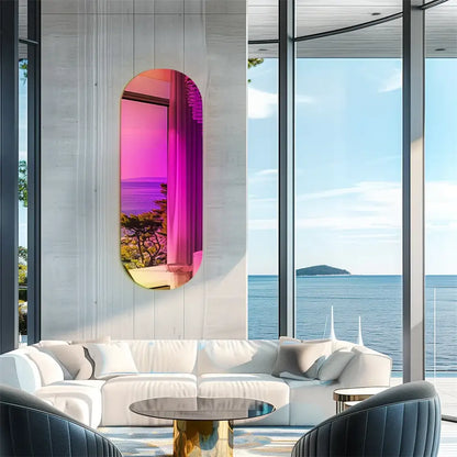 Modern interior with a colorful mirror reflecting an ocean view
