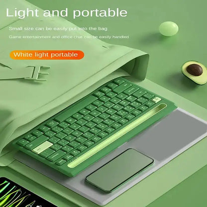 Green keyboard on a green surface with text about light and portable design.