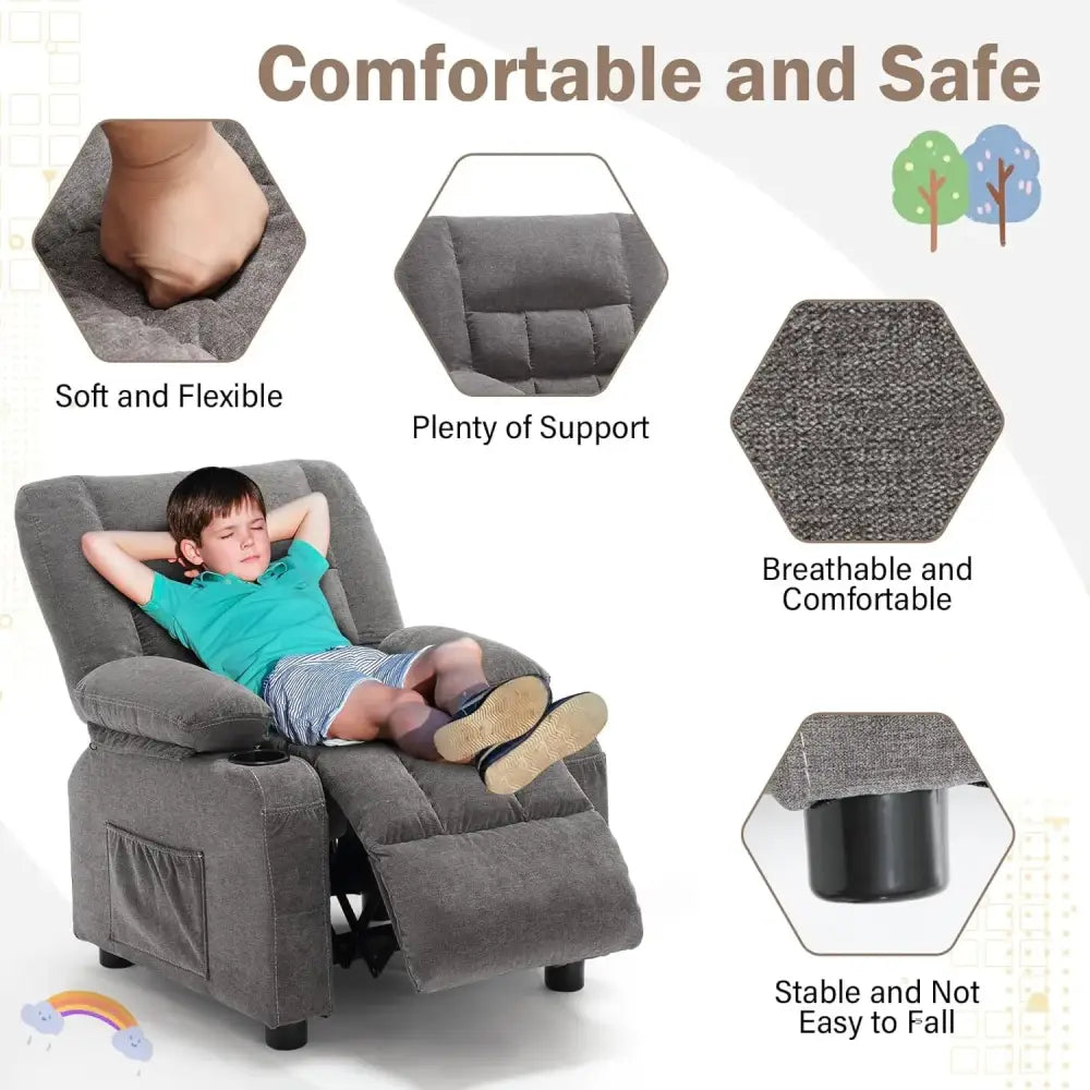 Grey kids recliner chair with dual cup holders and adjustable footrest in playroom