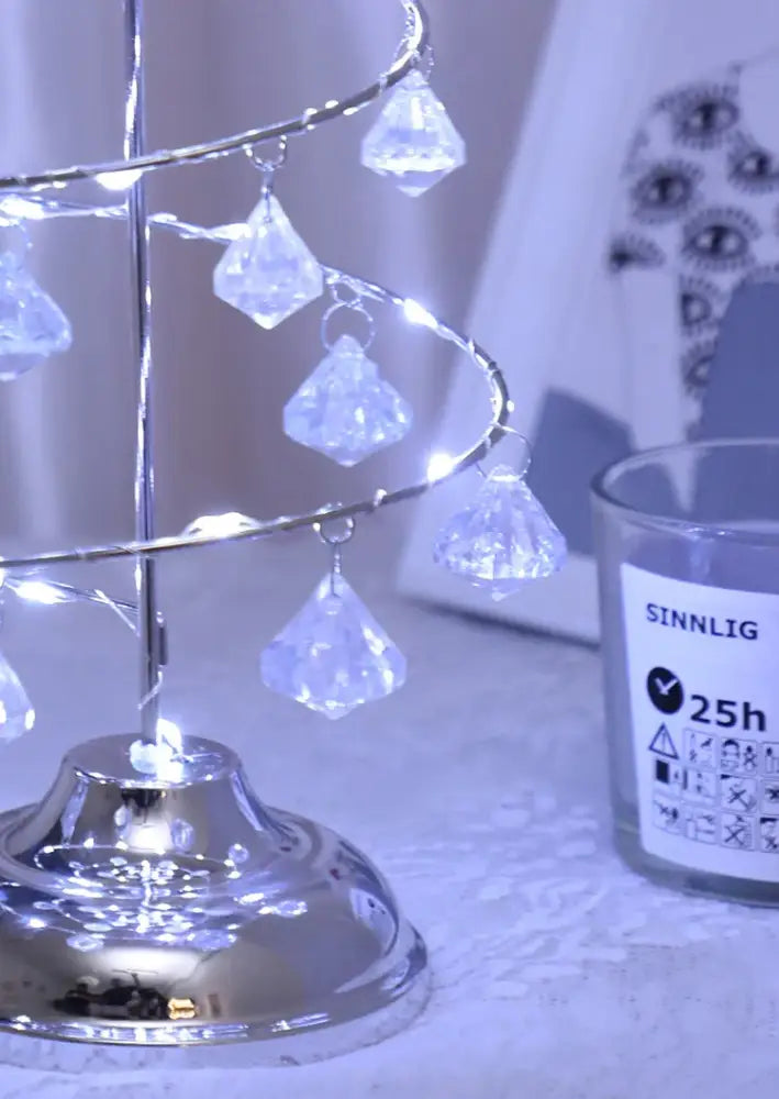 Christmas tree table lamp key features showing wrought iron plastic build and 13x33cm size
