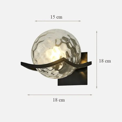 Wall light fixture with dimensions indicated on a white background