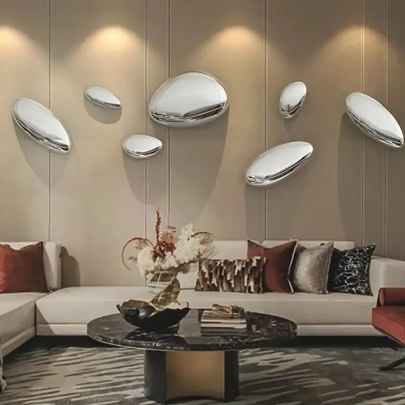 Modern living room with Water Drop Wall Decor and a stylish sofa.