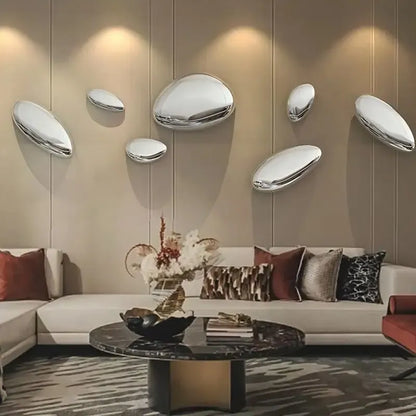 Modern living room with Water Drop Wall Decor and a stylish sofa.
