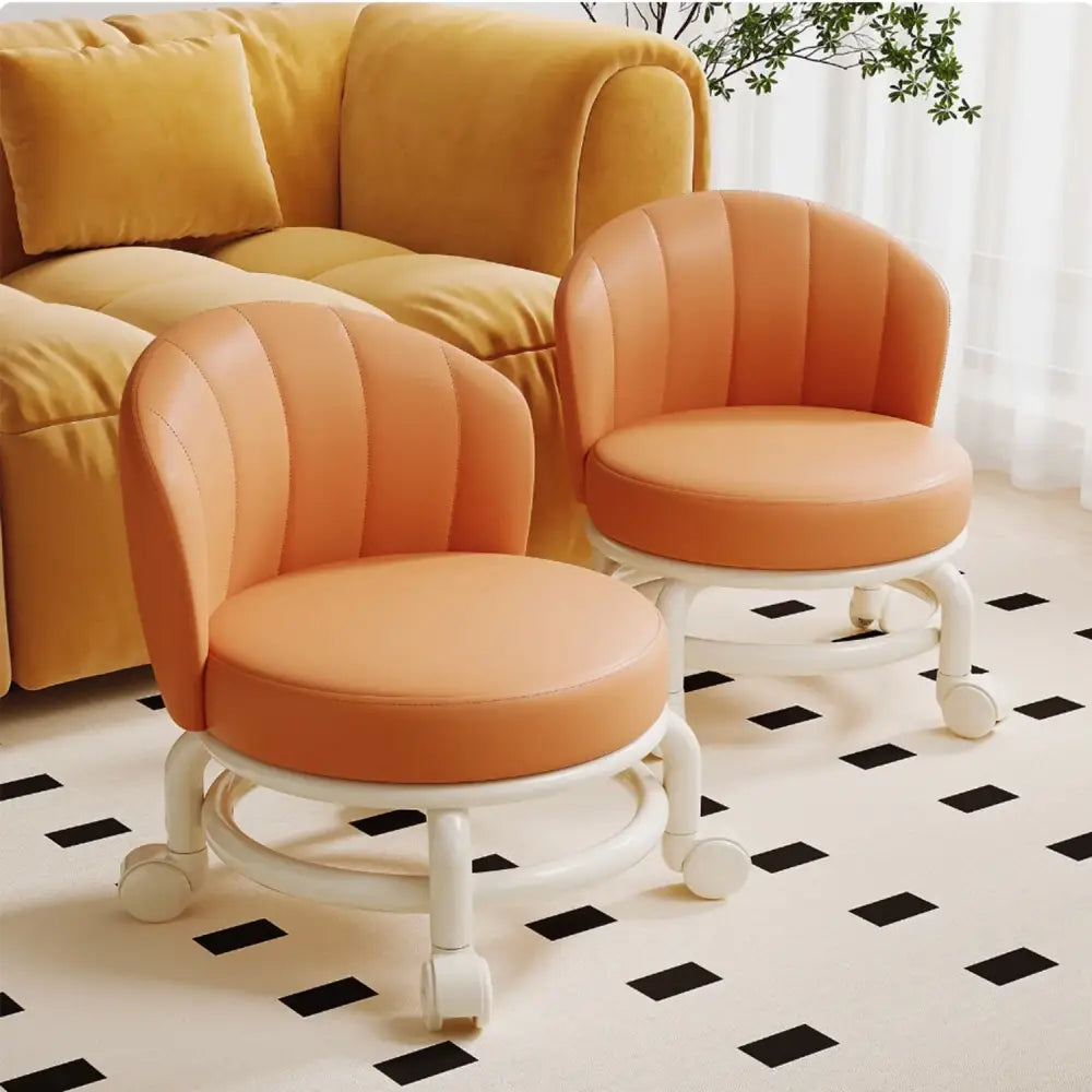 Low mobile stool compact size shown for garage cleaning and child care use