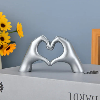 Modern Gold Heart Hand Statue