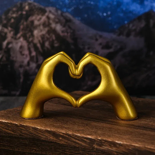 Modern Gold Heart Hand Statue