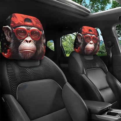Car seat covers with a monkey design wearing red sunglasses in a vehicle interior.