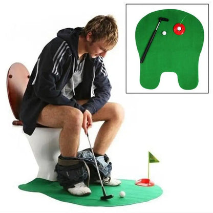 Person playing mini golf on a toilet with a green mat and golf accessories.