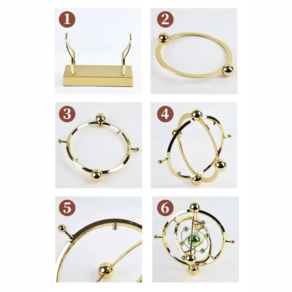 Space perpetual motion machine specifications showing ABS plastic and gold color finish