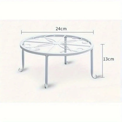  a decorative metal stand in front of stone steps.