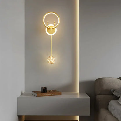 Modern wall lamp with a spherical light fixture on a neutral background