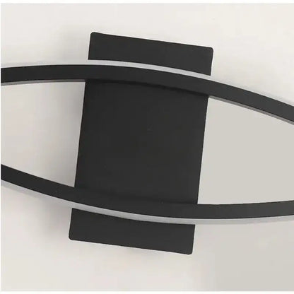 Modern wall light fixture with black and gray design on a white background