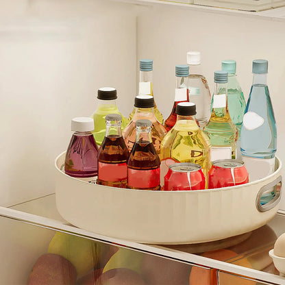 Assorted bottles and containers on a white tray with a neutral background