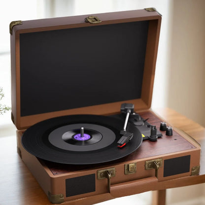 Wooden record player on a table with a blurred background